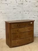 A Victorian mahogany bow front chest, fitted with two short and three long drawers flanked by