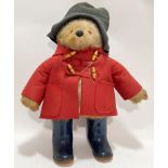 A Dunlop Paddington bear stuffed animal with glass eyes and coat/hat/boots etc... (h- 53cm)