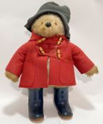 A Dunlop Paddington bear stuffed animal with glass eyes and coat/hat/boots etc... (h- 53cm)