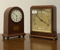 An early 20th century mahogany cased mantel clock time piece by Elliott, with silvered dial and