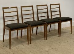 McIntosh, a set of four mid century teak dining chairs, each with rail backs over drop in