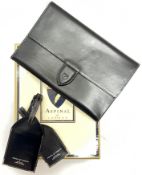 An Aspinal of London black leather document holder (w- 23.5cm) with luggage tags etc... in