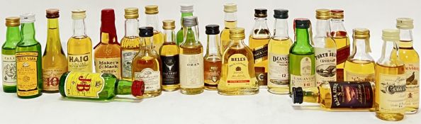 A mixed group of Whisky miniatures comprising Haig, Talisker, Dalmore, Bell's, Lagavulin, Famous Gro