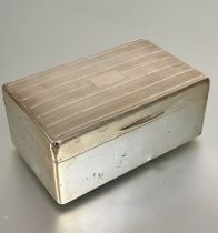 A Birmingham silver rectangular cigarette box with engine turned top with cedar lined interior, (