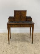 A late 19th century rosewood Bonheur du Jour writing desk in the Neoclassical taste, the