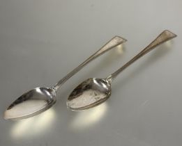 A pair of London George III silver old english thread pattern table spoons, with engraved initial