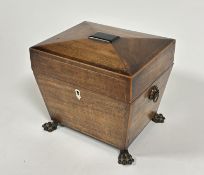 A  first quarter 19thc mahogany rosewood and boxwood strung veneered sarcophagus shaped tea caddy,