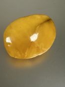 A Baltic egg yoke coloured amber panelled brooch, (W x 3.5 cm) 10.3g
