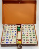 A boxed mahjong set with polymer counters and a faux crocodile skin travel case (w- 37.5cm)