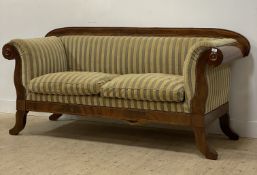 A 19th century Biedermeier mahogany scroll arm sofa, the well figured crest rail with boxwood string