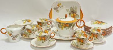 A 1930s Shelley 'Cape Gooseberry' Art Deco tea service comprising a teapot (h- 14.5cm, w- 24cm), two