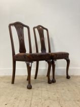 A pair of early 20th century mahogany splat back dining chairs with buttoned oxblood leather