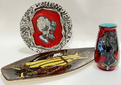 A San Marino type rock/lava glazed dish with sgraffito decoration of a young lady against a red