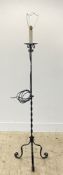 A wrought iron lamp standard formed as a candelabra, on three scrolling supports. H155cm.