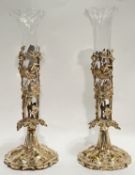 A pair of silver plated epergnes modelled as meadow flowers with scalloped edge glass liner (h- 35cm