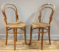 A pair of early 20th century bentwood side chairs by Fishcel in the style of Thonet H87cm.