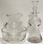 A cut crystal engraved glass thistle form decanter (h- 31.5cm), together with a cut crystal jug