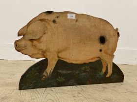 An early 20th century "fireside friend" painted dummy board depicting a sow H32cm.