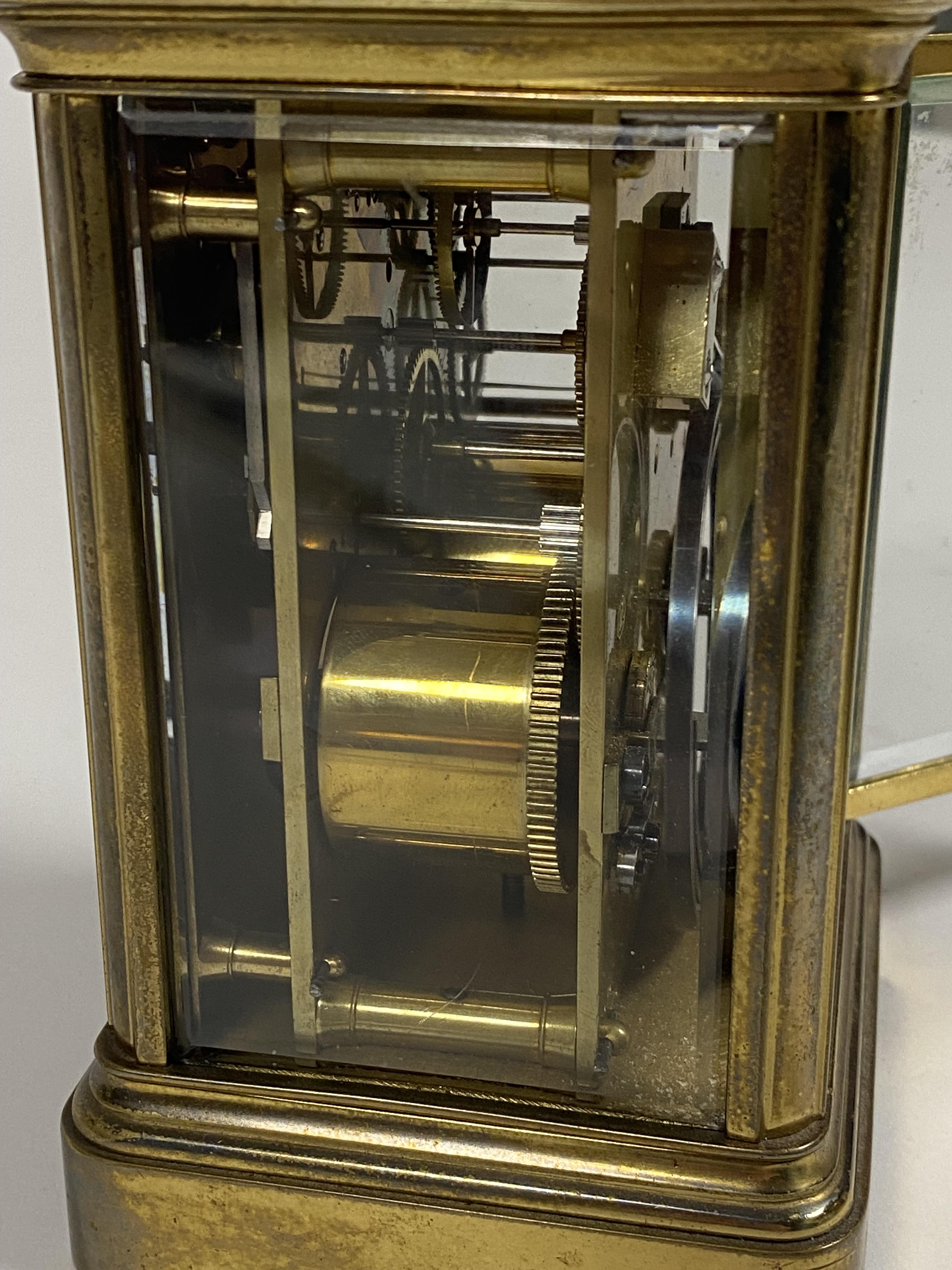 A French brass repeating carriage clock, late 19th century, the gilt brass case with swing handle an - Image 5 of 7