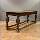 A country oak refectory table of pegged and jointed construction, 18th century and later
