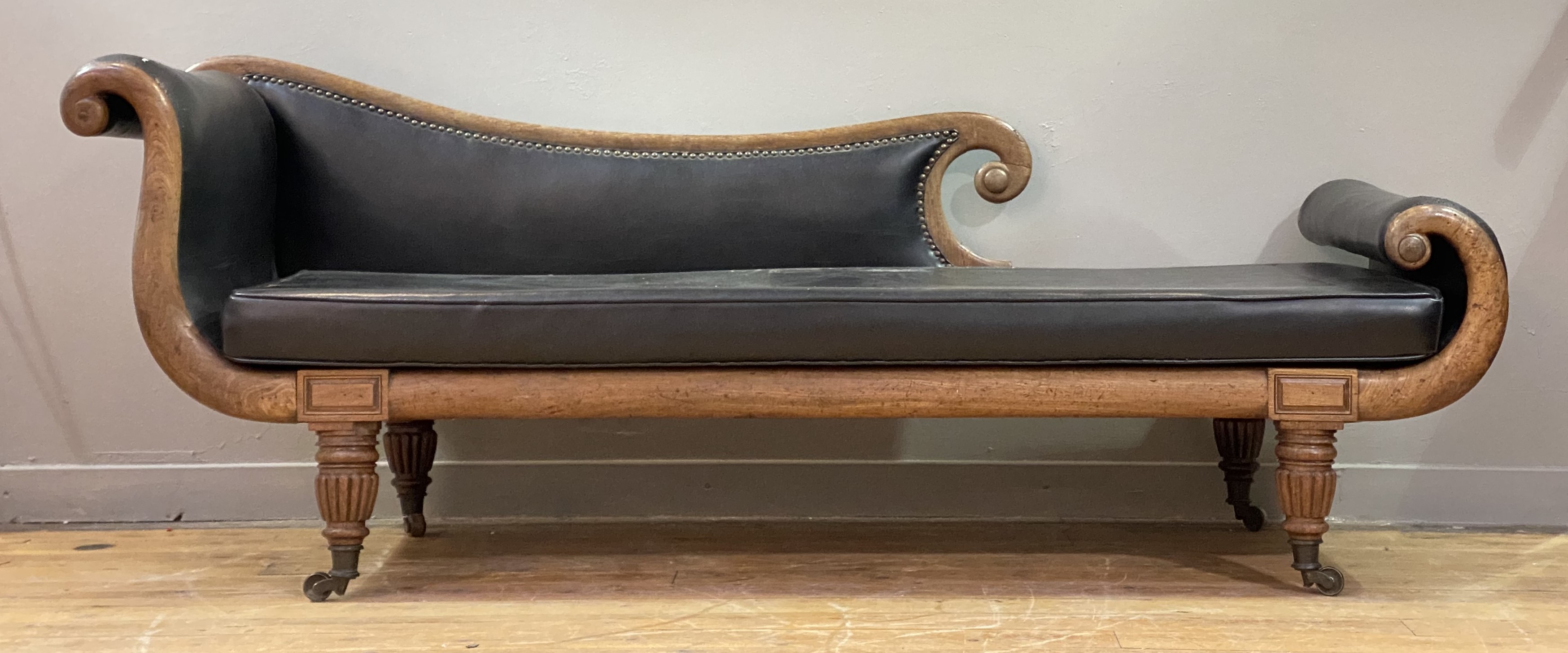 A late Regency mahogany-framed chaise longue, the scrolling show frame with squab cushion - Image 2 of 3