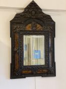 An ornate wall hanging mirror in the Baroque style, early 20th century