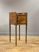 A George III mahogany bedside cabinet, the galleried top with pierced carry handle to each side
