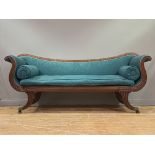 A Regency mahogany scroll arm sofa, circa 1820, the undulating back, arms, squab and bolster