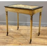 A Regency style side table, 20th century, the top painted with a stylised sphinx within a