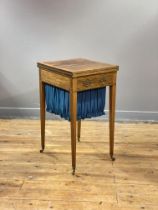 A rosewood work and games table in the Regency taste, c. 1900