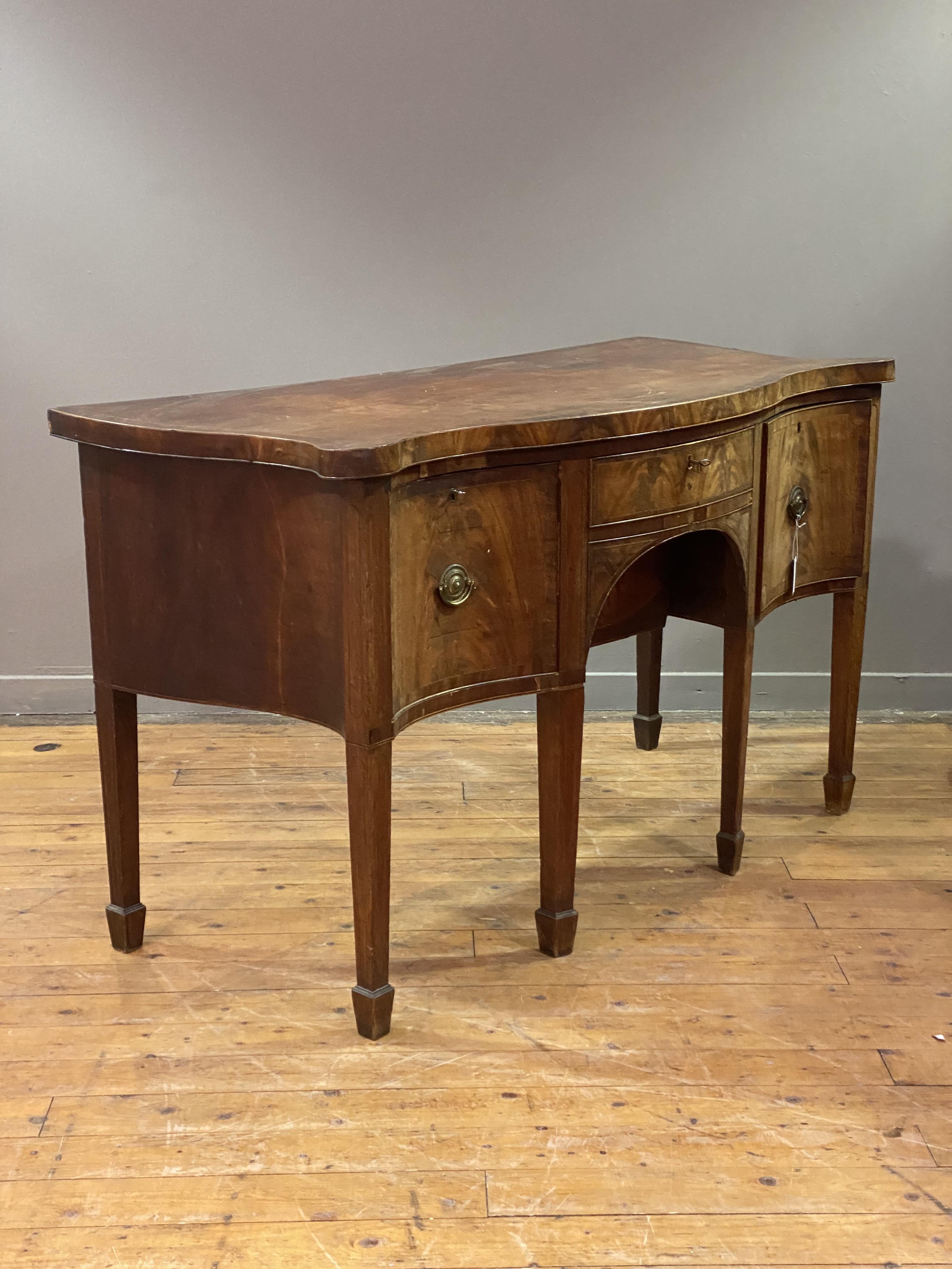 A George III mahogany serving table of deep and squat proportions, late 18th century, the - Image 2 of 4