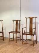A set of eight Chinese Ming style hardwood dining chairs