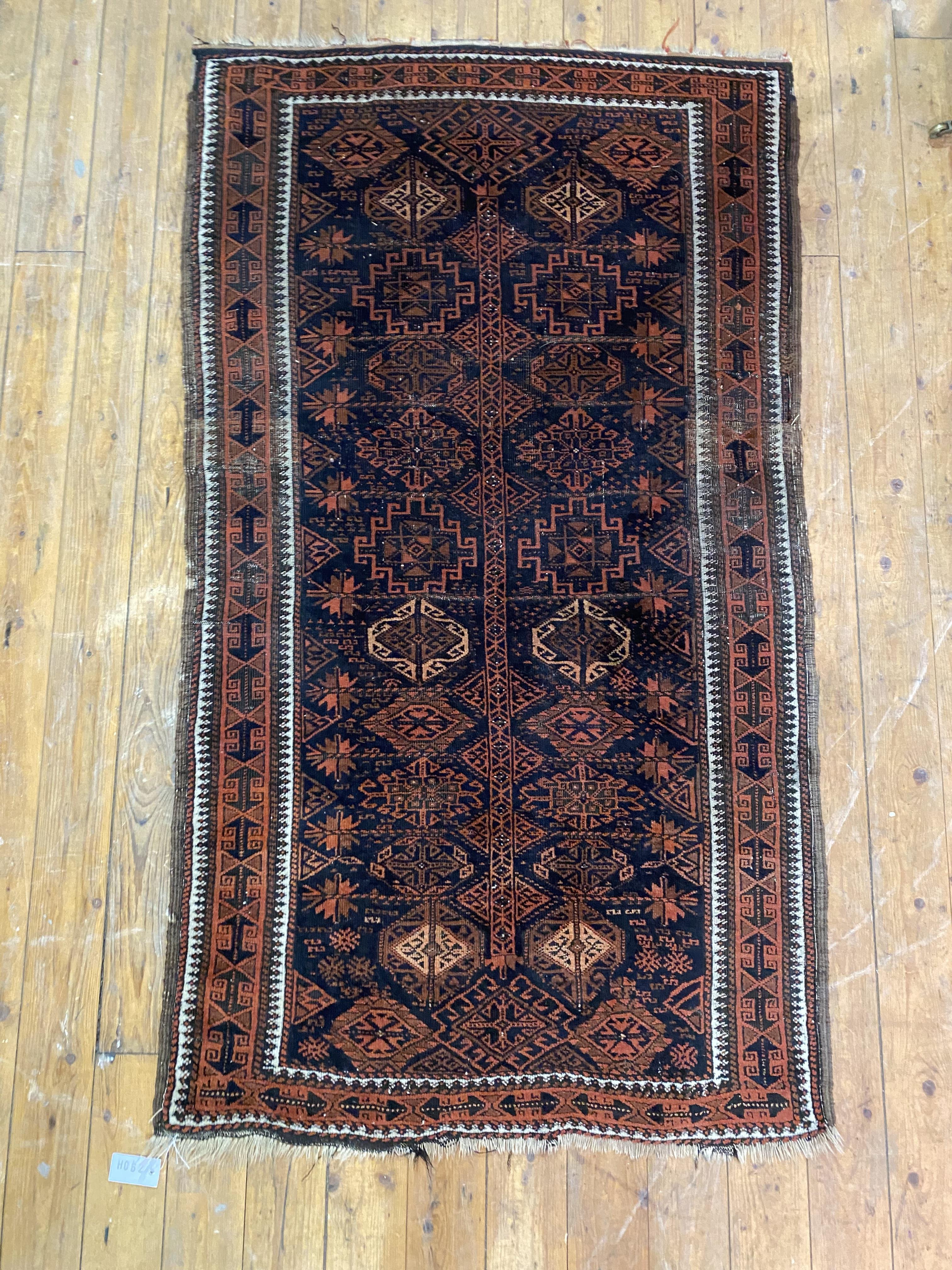 A 19th century Persian Baluch rug