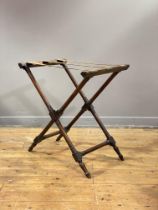 An early 19th century mahogany butlers tray stand