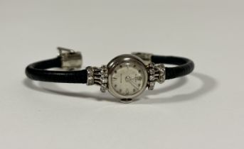 Rolex: a lady's diamond-set 18ct white gold "Precision" cocktail watch, c. 1950