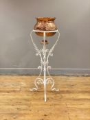 A late 19th / early 20th century copper and white painted wrought iron jardinière and stand, the