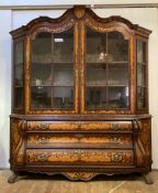 A Dutch bombe walnut and boxwood marquetry display cabinet, 20th century, the undulating top above