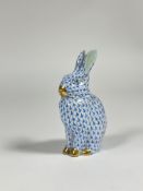 A Herend porcelain model of a seated rabbit