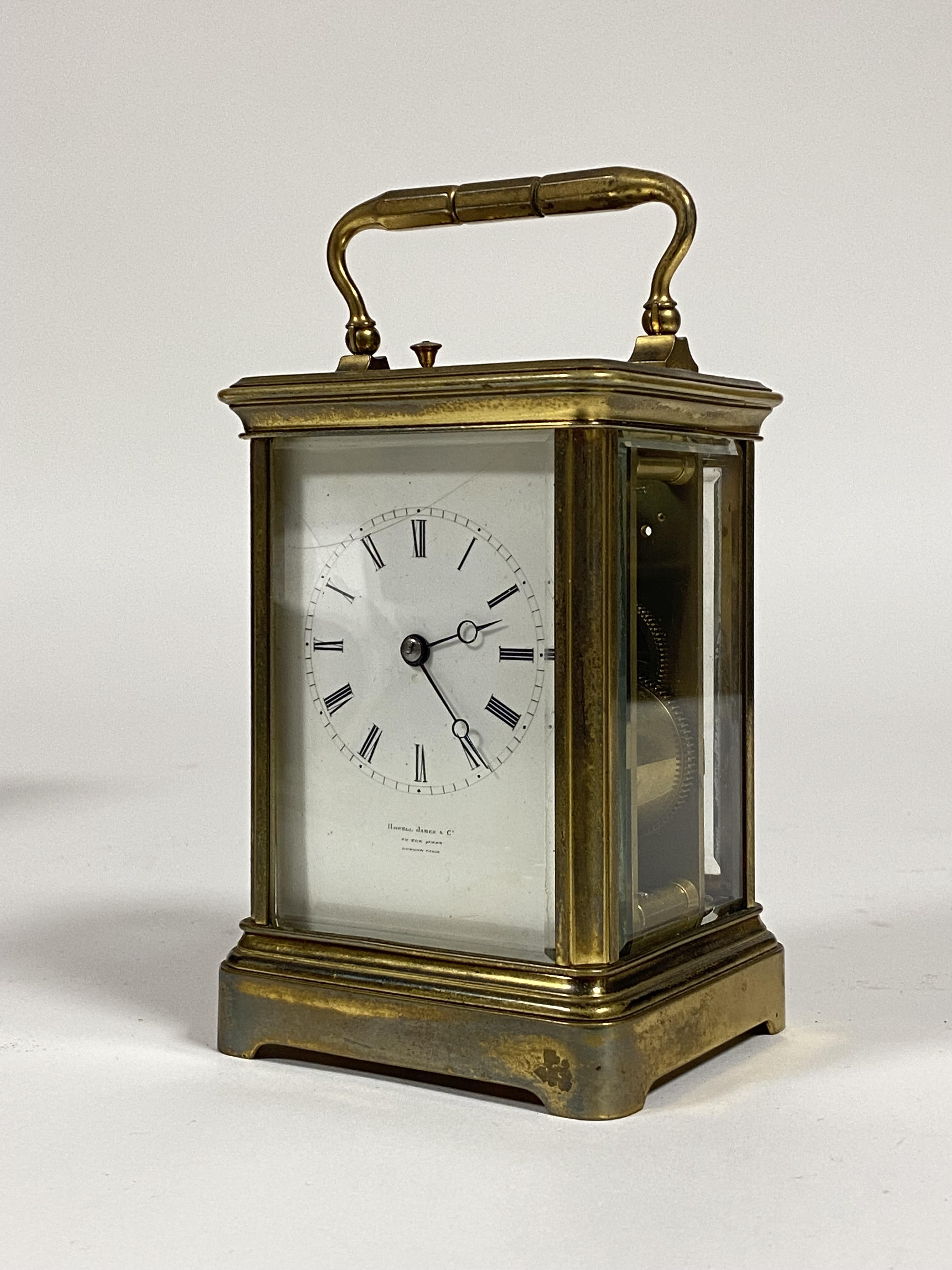 A French brass repeating carriage clock, late 19th century, the gilt brass case with swing handle an - Image 2 of 7