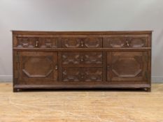 A William and Mary style country oak dresser base of pegged and jointed construction, 19th