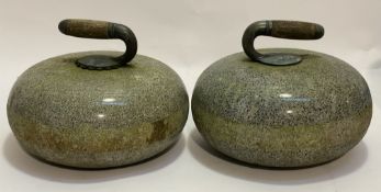 A pair of green granite curling stones