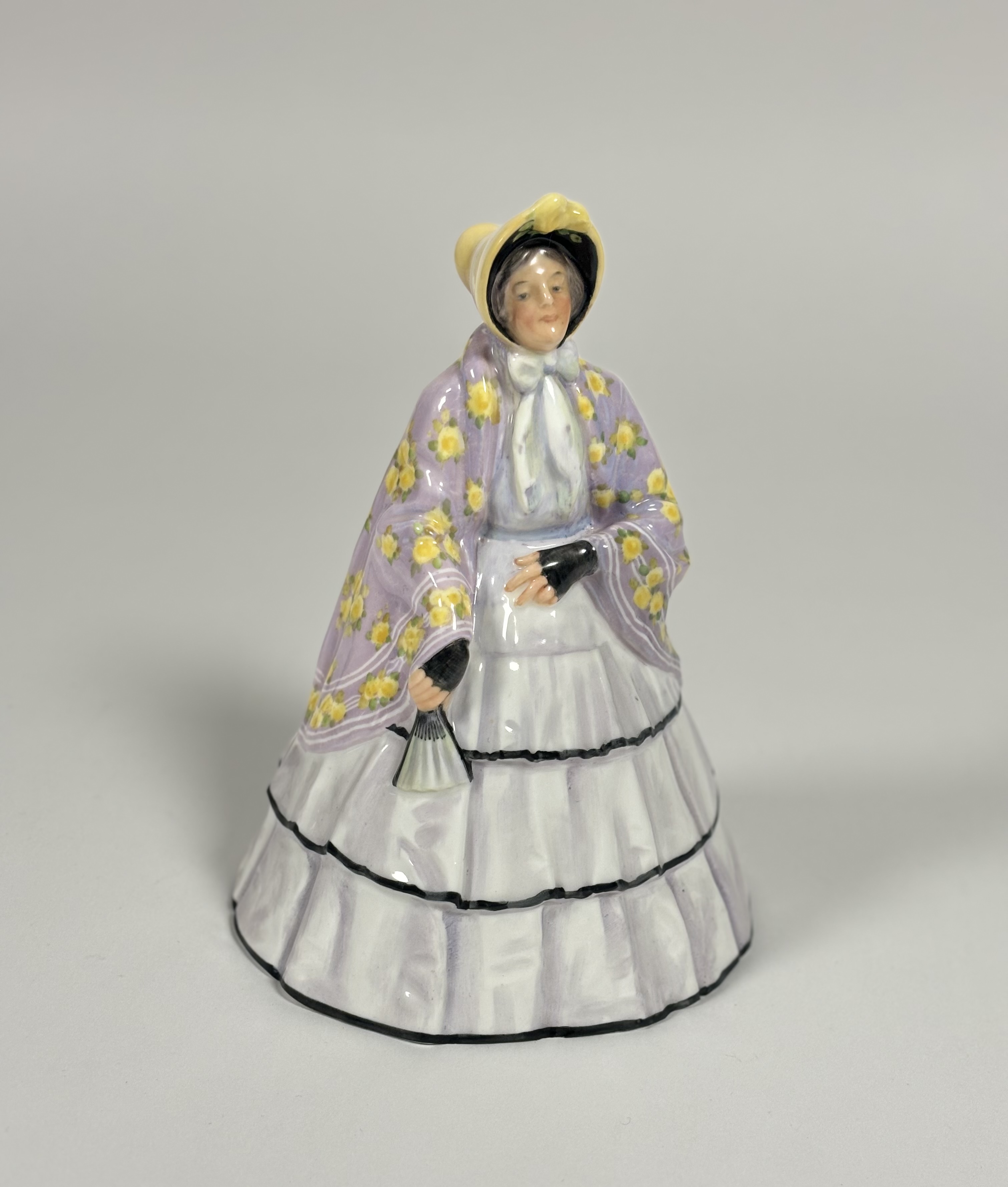 An early Royal Doulton figure, The Lilac Shawl, mid-1920's