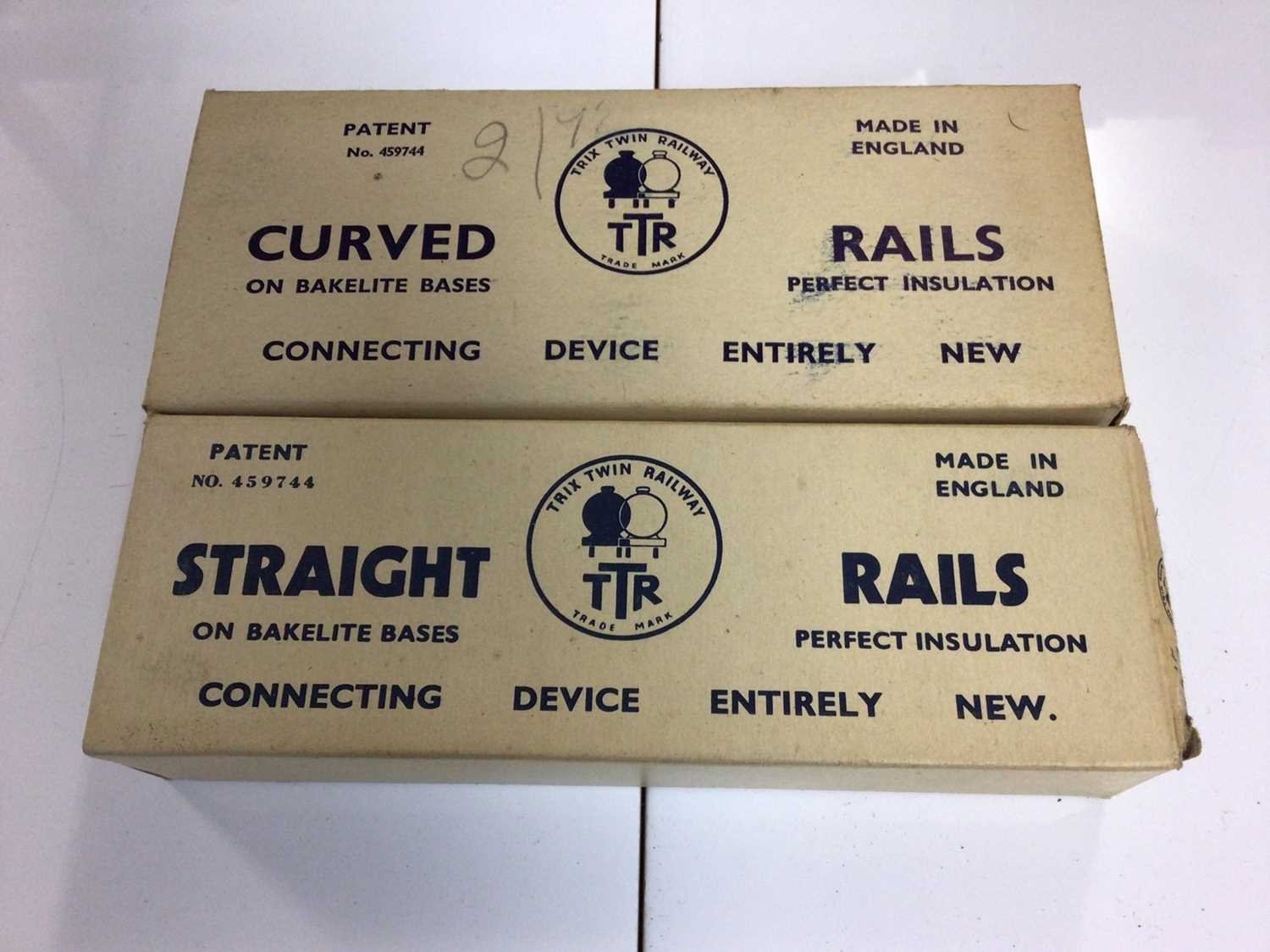 Trix OO gauge track including Straight Rails, boxed 420/1(x17) and Curved Rails, boxed 410/1 (x6)