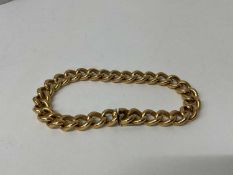 Continental yellow metal curb link bracelet