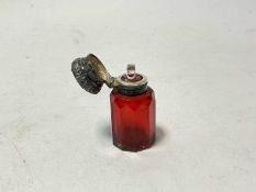 Victorian ruby glass scent bottle with floral embossed silver top