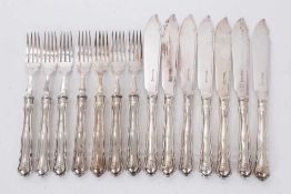 Set of seven pairs of silver plated fish eaters, handles stamped CTR.