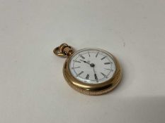 Early 20th century American 10ct gold fob watch with white enamel dial, the rear of the case marked
