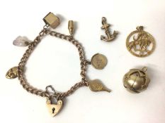 9ct rose gold charm bracelet with padlock clasp and six charms, plus three loose
