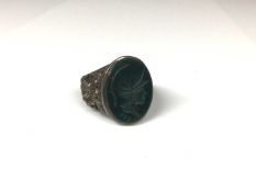 Silver seal ring with engraved bloodstone oval plaque depicting a Roman soldier's head