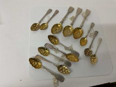 Group of ten Georgian and later silver tea and desert spoons with later chased and embossed 'Berry s
